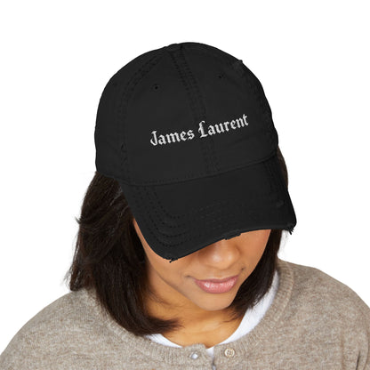 Black James Laurent embroidered cap worn from the front