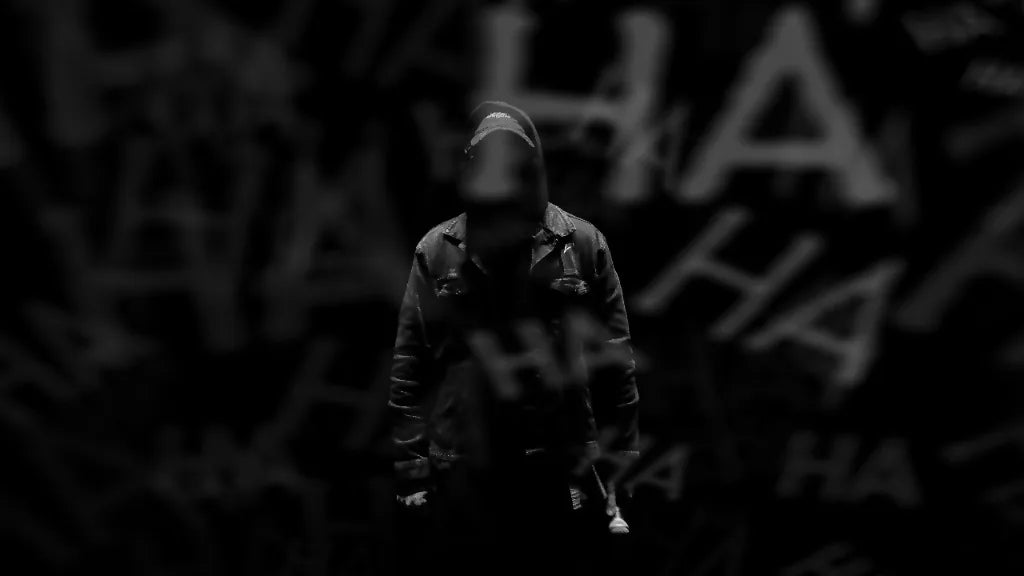James Laurent standing against a dark handwritten backdrop